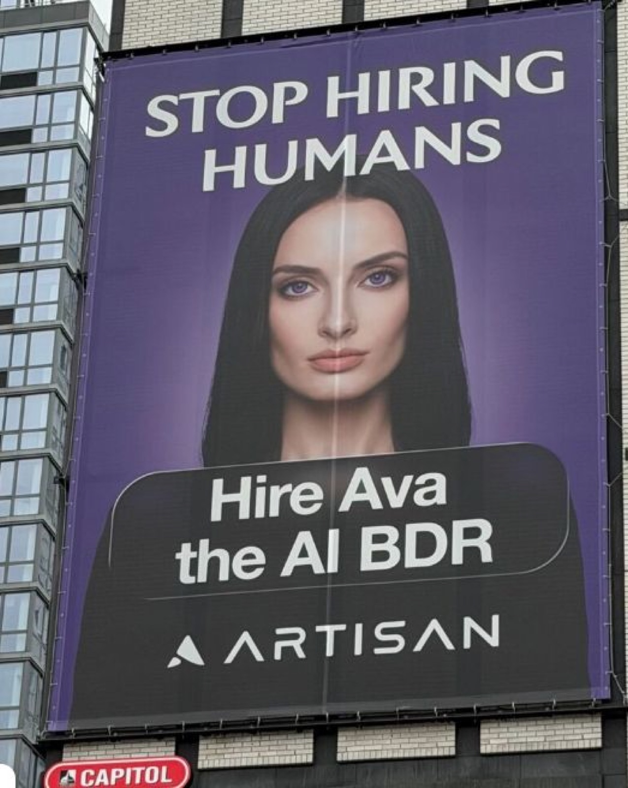 Artisan billboard reading Stop Hiring Humans, Hire Ava the AI BDR